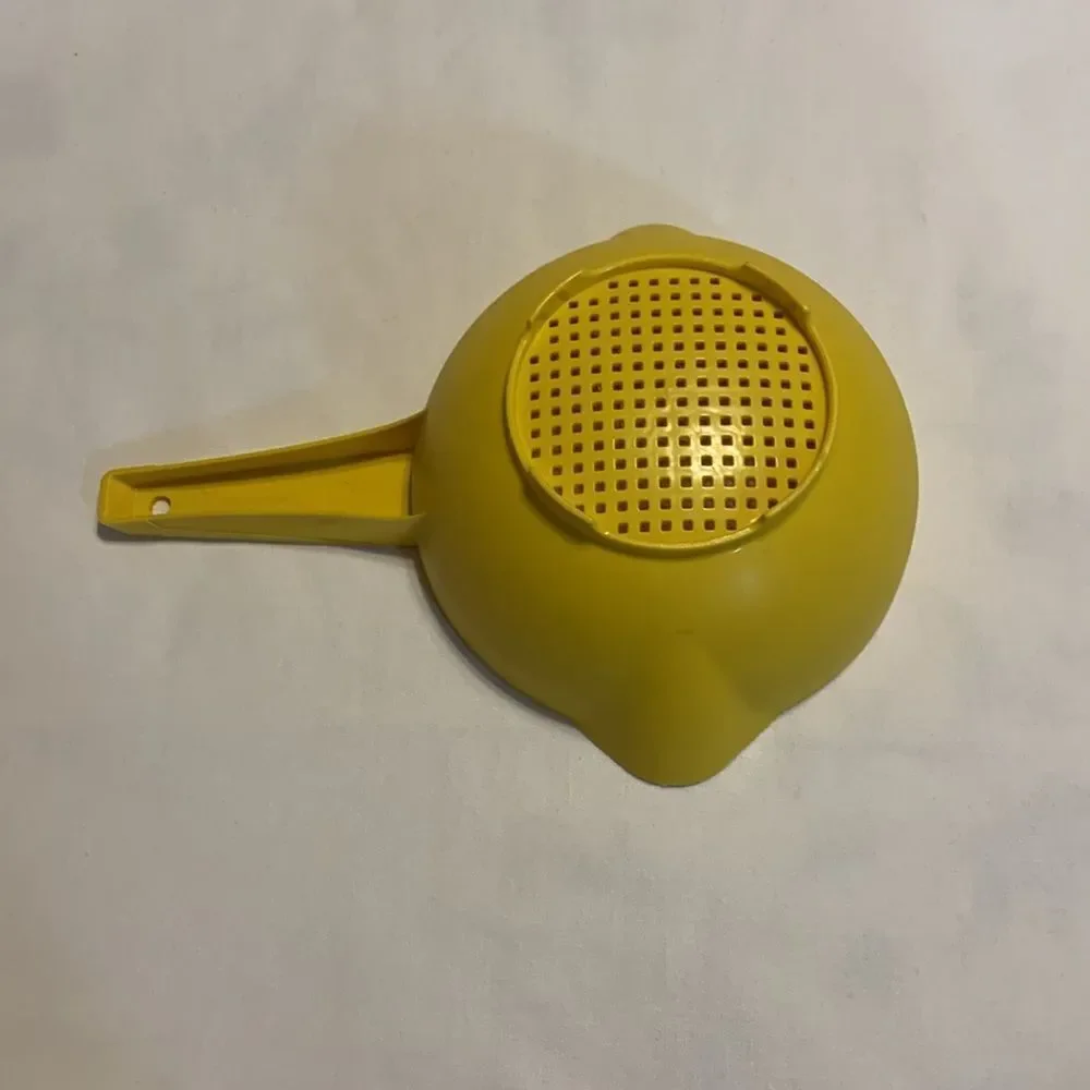 Tupperware Vintage yellow strainer